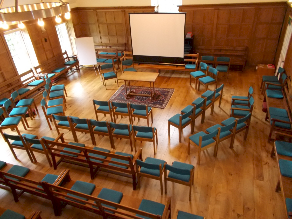 Interior of Oxford Meeting House with movable chairs set out in concentric circles. /images/library/large/set_up_lecture.jpg
